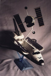 model of HST on Shuttle's arm