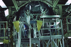 Under nose of Shuttle Discovery being refurbished in OPF